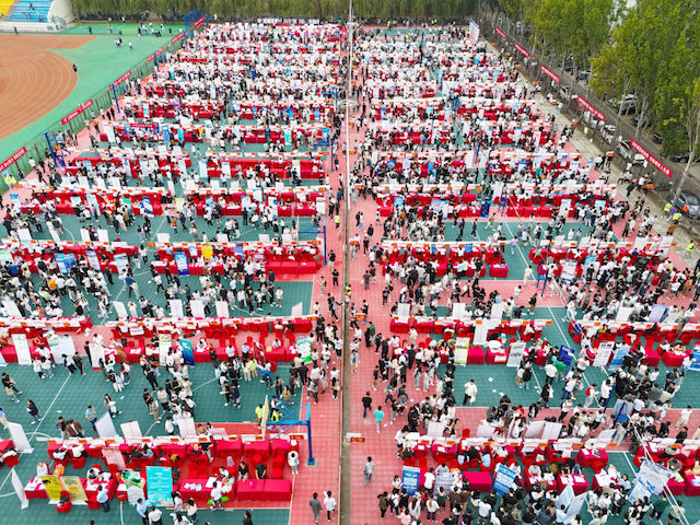 QINGDAO, CHINA - SEPTEMBER 23, 2023 - College students look for suitable positions at the autumn campus double selection fair of Shandong University of Science and Technology in Qingdao, Shandong province, China, Sept 23, 2023. (Photo by Costfoto/NurPhoto via Getty Images)