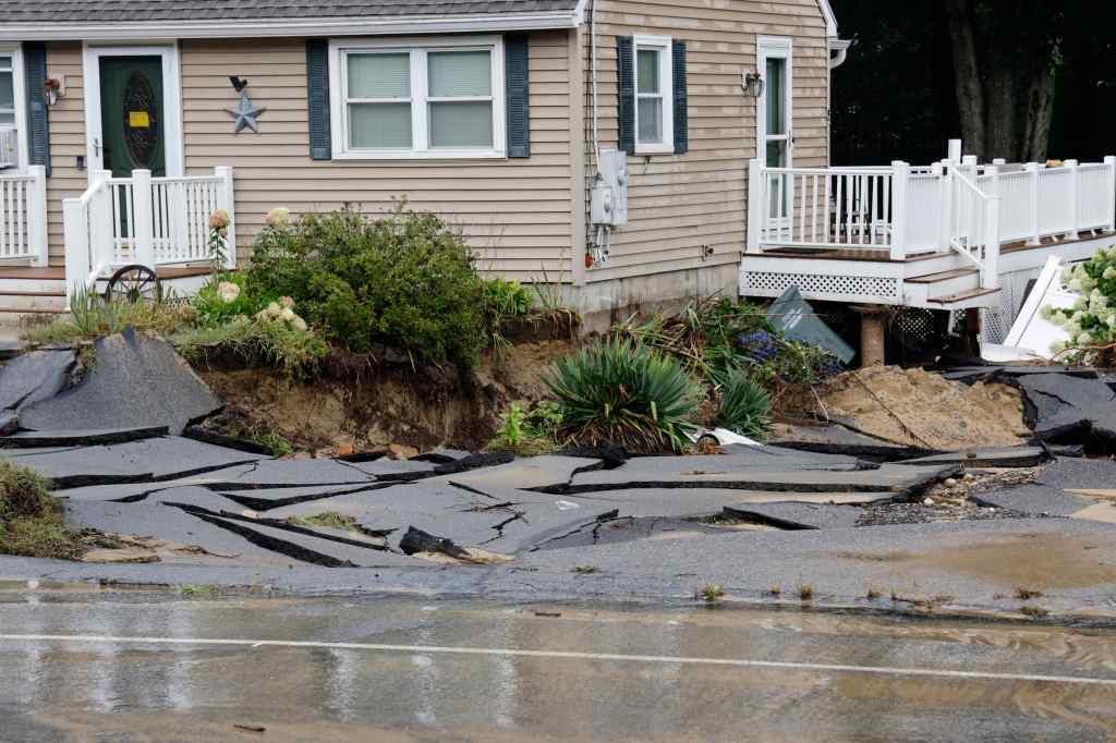 Two days after major flooding from 10 inches of rain, Leominster, MA residents cleaned up and assessed the damage.
