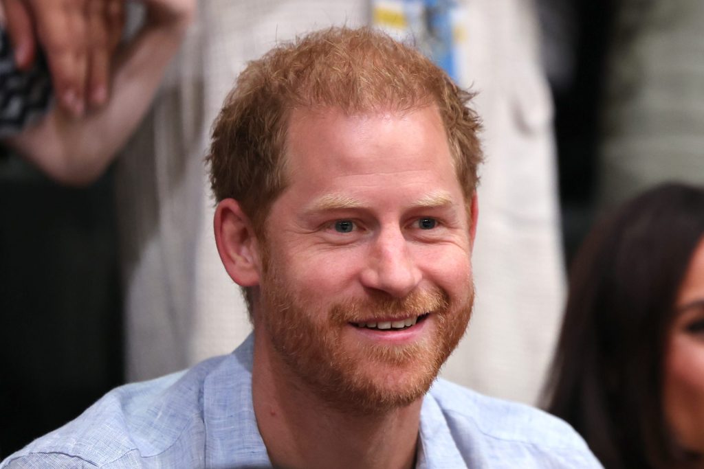 The Duke of Sussex appeared red-faced during the celebratory rendition.