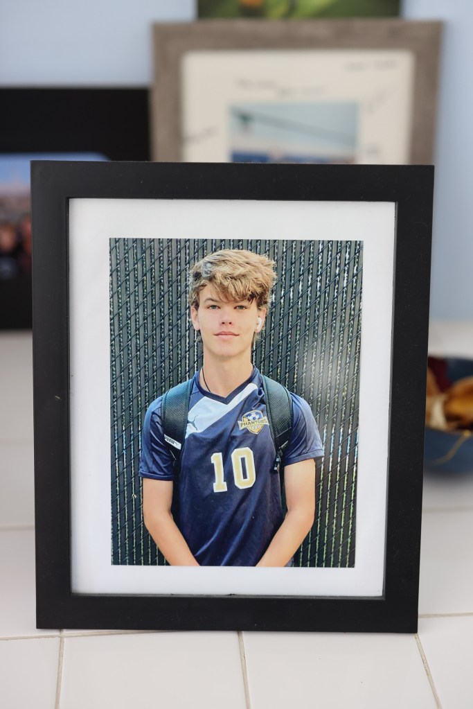 A framed photo of Chase Nasca in his soccer uniform. 