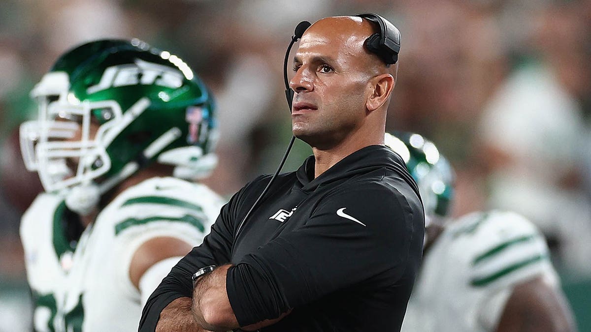 Robert Saleh stands on the sidelines