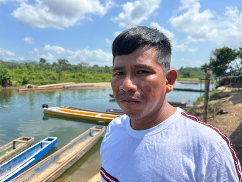 Nelson Aji stands on the banks of the Turquesa River