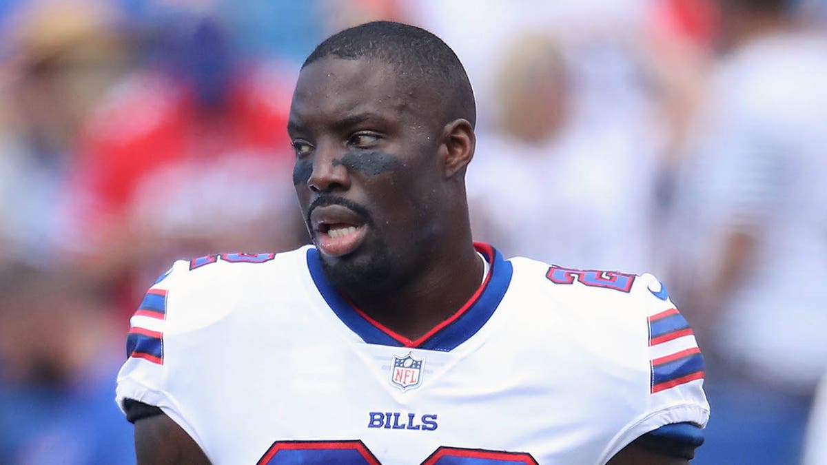 Vontae Davis looks on field